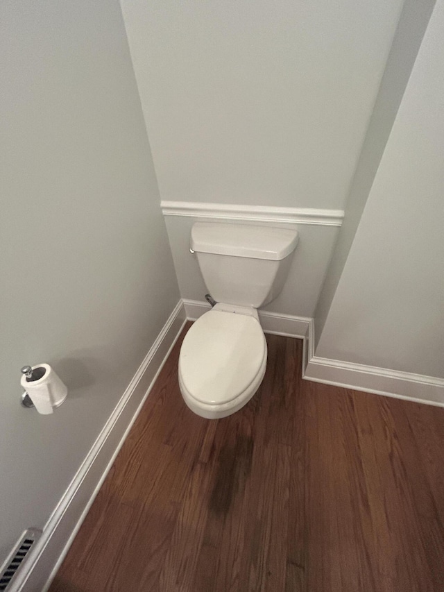 902 Patriots Pt, Mccormick, SC 29835 - bathroom featuring baseboards, wood finished floors, and toilet