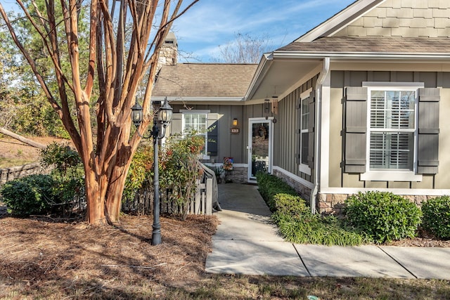 1215 Brookstone Way, Augusta, GA 30909 - entrance to property with a shingled roof, a chimney, board and batten siding, and stone siding