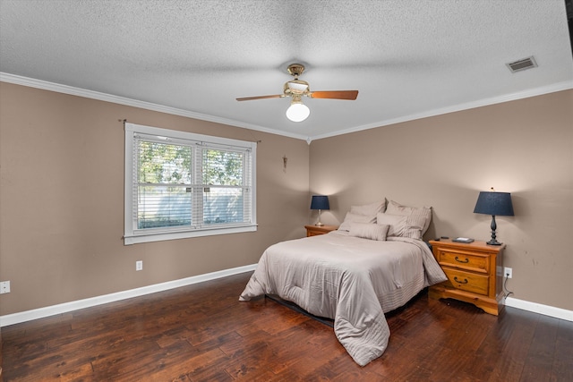 bedroom featuring ceiling fan, dark hardwood / wood-style flooring, and ornamental molding