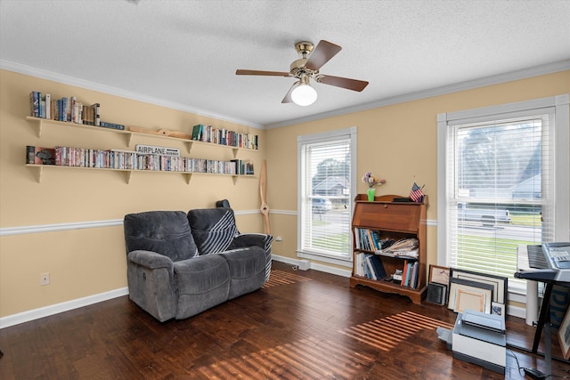 sitting room featuring crown molding, dark hardwood / wood-style flooring, ceiling fan, and a textured ceiling