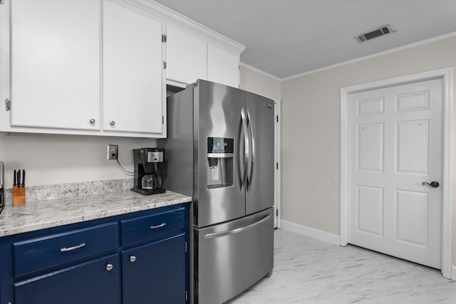 kitchen with white cabinets, stainless steel fridge with ice dispenser, crown molding, and blue cabinets