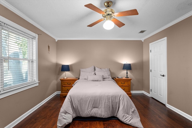 bedroom with ceiling fan, dark hardwood / wood-style floors, and crown molding