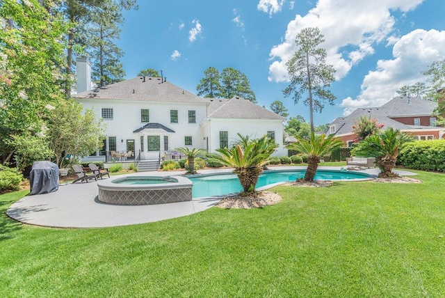 506 Creek Blf, Martinez, GA 30907 - view of swimming pool featuring a patio area, a lawn, and a pool with connected hot tub