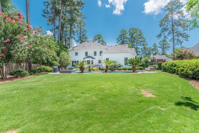 506 Creek Blf, Martinez, GA 30907 - back of house featuring a patio and a chimney