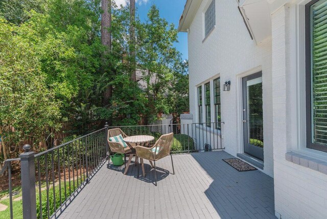 506 Creek Blf, Martinez, GA 30907 - wooden terrace with outdoor dining area