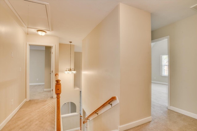 1123 Blackfoot Dr, Evans, GA 30809 - hall with attic access, an upstairs landing, and light colored carpet