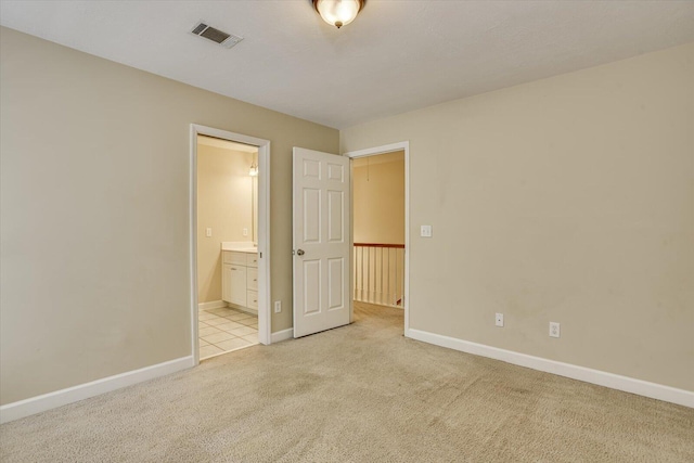 1123 Blackfoot Dr, Evans, GA 30809 - unfurnished bedroom featuring light colored carpet and ensuite bath