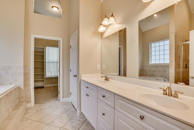 1123 Blackfoot Dr, Evans, GA 30809 - full bath featuring tile patterned floors, a garden tub, double vanity, and a shower stall