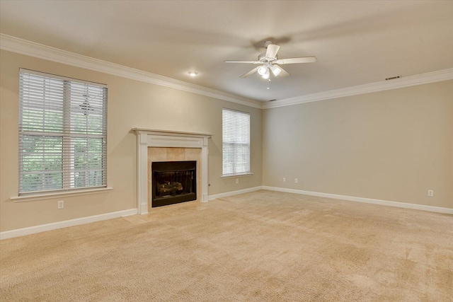 1123 Blackfoot Dr, Evans, GA 30809 - unfurnished living room featuring ornamental molding, a ceiling fan, a tile fireplace, and carpet floors