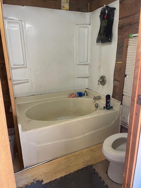 bathroom featuring tile patterned floors and toilet