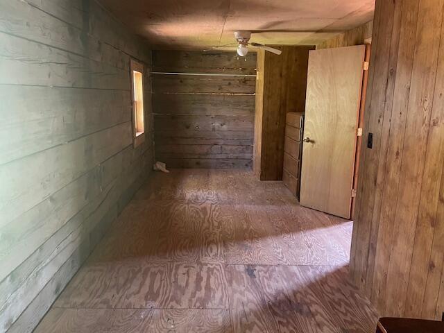 hallway with wooden walls