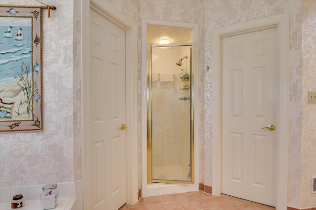 3725 Wexford Dr, Martinez, GA 30907 - bathroom with wallpapered walls, a shower stall, and tile patterned floors