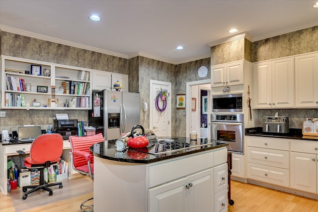 3725 Wexford Dr, Martinez, GA 30907 - kitchen featuring appliances with stainless steel finishes, light wood-style floors, a center island, white cabinets, and recessed lighting
