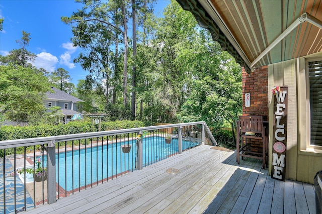 3725 Wexford Dr, Martinez, GA 30907 - wooden terrace featuring an outdoor pool and view of wooded area