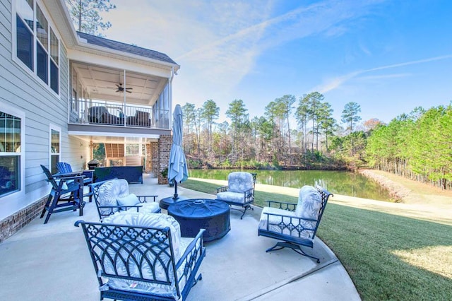 view of patio / terrace featuring outdoor lounge area, ceiling fan, and a balcony