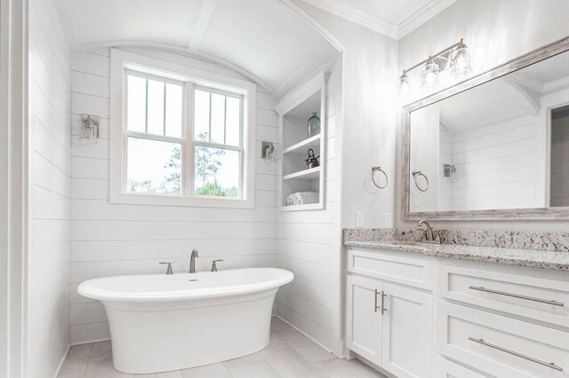 bathroom with a bathtub and vanity