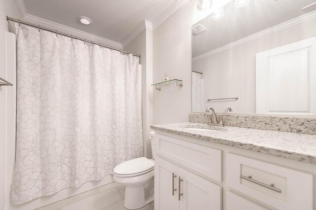 full bathroom featuring tile patterned floors, shower / bath combination with curtain, toilet, vanity, and ornamental molding