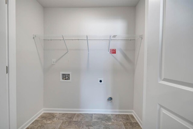 clothes washing area featuring washer hookup and hookup for an electric dryer