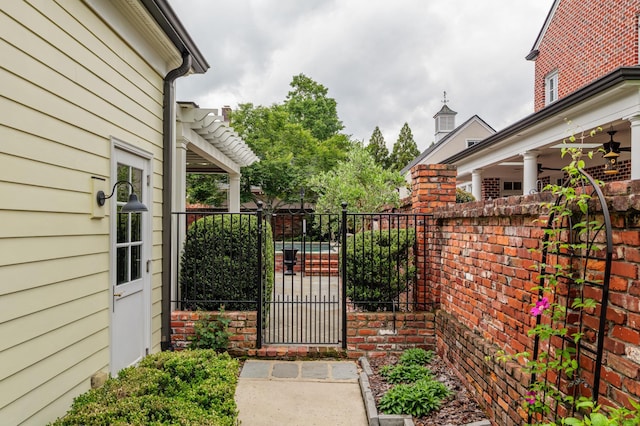 1201 Reid Rd, Augusta, GA 30909 - view of gate with fence and ceiling fan