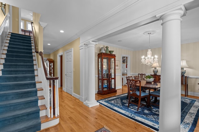 1201 Reid Rd, Augusta, GA 30909 - dining room with recessed lighting, stairway, light wood-style floors, ornate columns, and ornamental molding