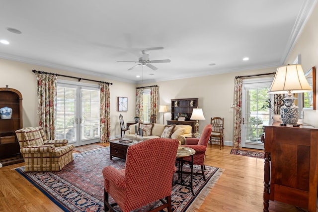 1201 Reid Rd, Augusta, GA 30909 - living room with light wood-type flooring, ceiling fan, and crown molding