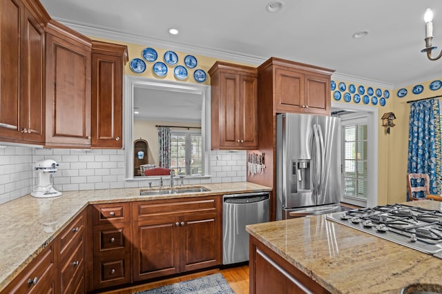1201 Reid Rd, Augusta, GA 30909 - kitchen with crown molding, a sink, stainless steel appliances, and a healthy amount of sunlight