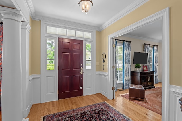 1201 Reid Rd, Augusta, GA 30909 - entrance foyer featuring wainscoting, crown molding, light wood-style flooring, and a decorative wall
