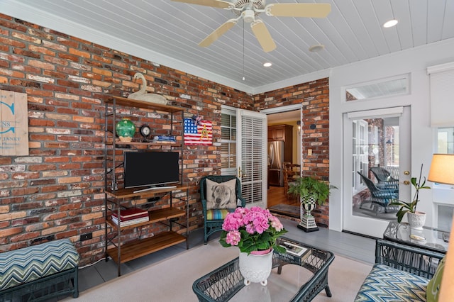 1201 Reid Rd, Augusta, GA 30909 - living area featuring ceiling fan, brick wall, crown molding, and recessed lighting
