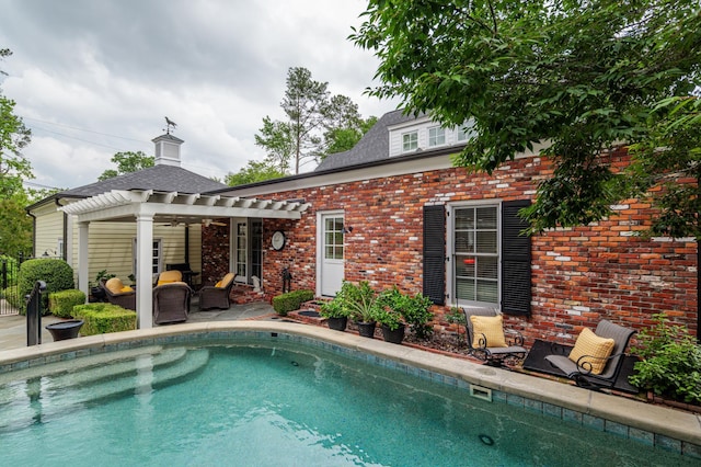 1201 Reid Rd, Augusta, GA 30909 - rear view of property with a patio, a ceiling fan, an outdoor pool, and brick siding