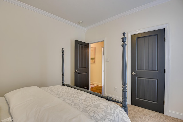 carpeted bedroom with crown molding