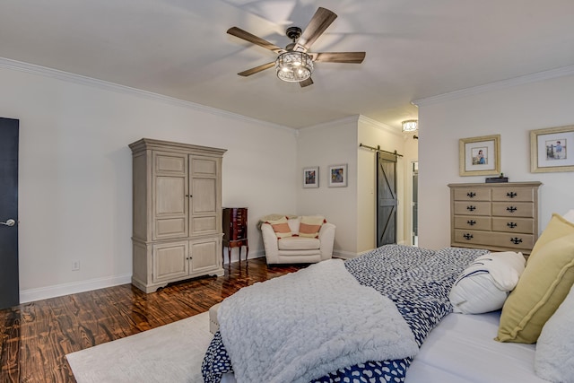 bedroom with a barn door, ceiling fan, crown molding, and dark hardwood / wood-style floors