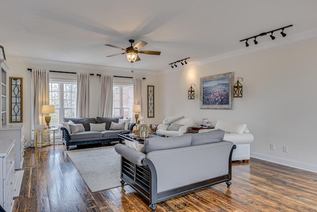 living room with ceiling fan, dark hardwood / wood-style flooring, track lighting, and ornamental molding