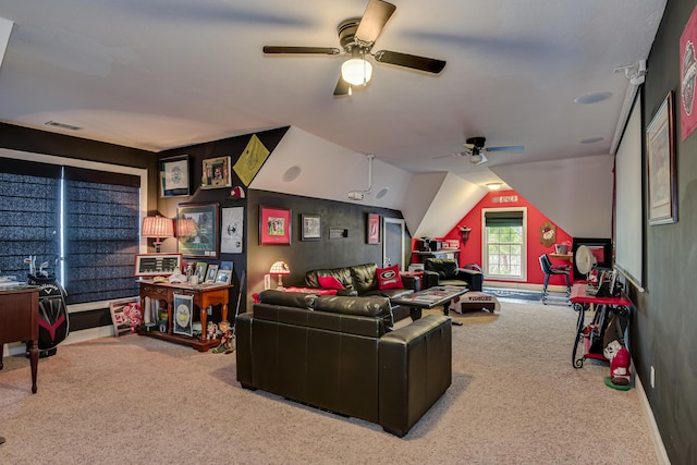 living room with carpet, ceiling fan, and lofted ceiling