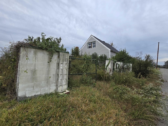 view of outdoor structure featuring fence