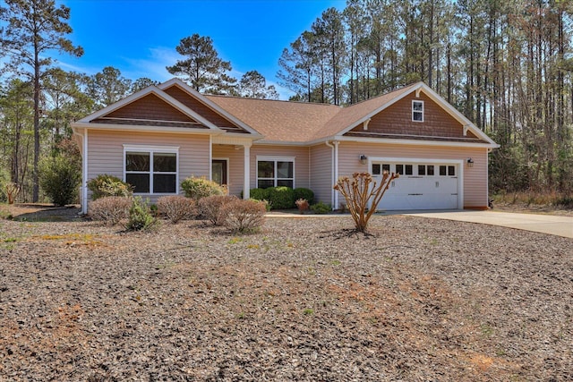 113 Rutledge Ln, Mccormick, SC 29835 - craftsman-style home featuring roof with shingles, driveway, and a garage