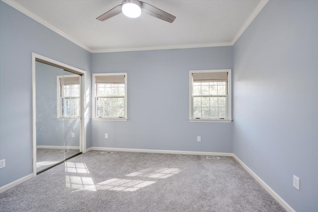 305 Kingfisher Pt, Mccormick, SC 29835 - unfurnished bedroom featuring ornamental molding, carpet, and multiple windows