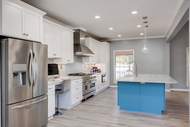 305 Kingfisher Pt, Mccormick, SC 29835 - kitchen featuring white cabinetry, hanging light fixtures, stainless steel appliances, a center island with sink, and wall chimney exhaust hood