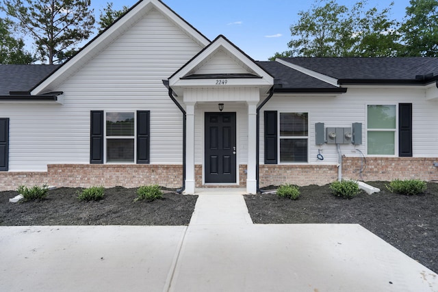 2242 Archer Ln, Augusta, GA 30906 - view of front of home featuring brick siding and roof with shingles