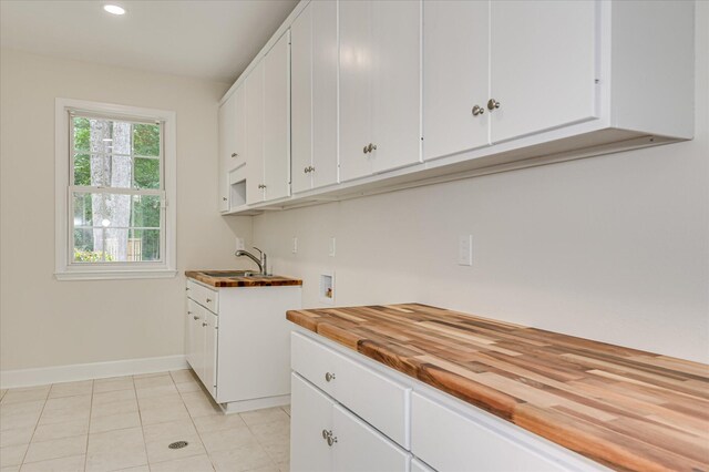 1 Bohler Ave, Evans, GA 30809 - kitchen featuring butcher block countertops, white cabinetry, light tile patterned floors, and recessed lighting