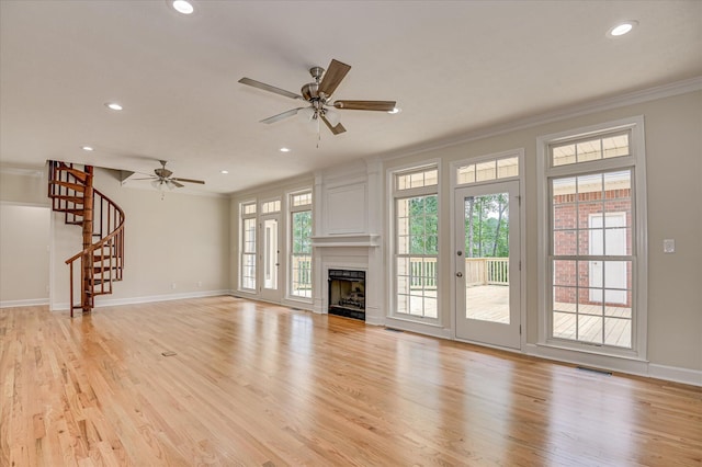 1 Bohler Ave, Evans, GA 30809 - unfurnished living room featuring a ceiling fan, recessed lighting, crown molding, stairs, and light wood-style flooring
