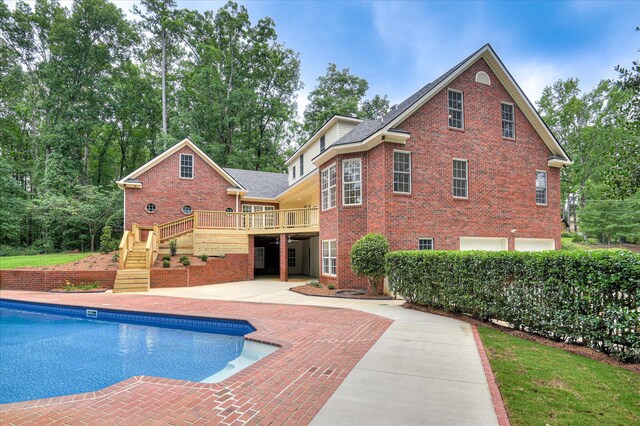 1 Bohler Ave, Evans, GA 30809 - swimming pool featuring a wooden deck, stairway, and a patio area