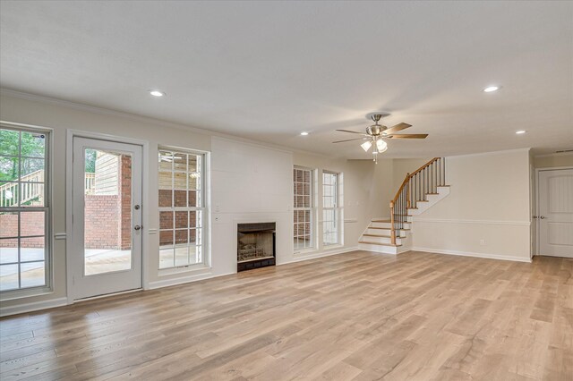 1 Bohler Ave, Evans, GA 30809 - unfurnished living room featuring ornamental molding, a ceiling fan, recessed lighting, light wood finished floors, and stairs