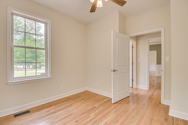 1 Bohler Ave, Evans, GA 30809 - unfurnished room with healthy amount of natural light, light wood-type flooring, and ceiling fan
