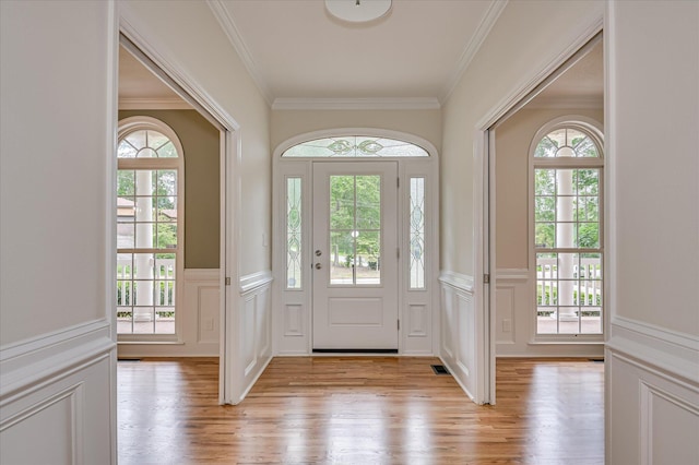 1 Bohler Ave, Evans, GA 30809 - foyer entrance with a decorative wall, wainscoting, light wood-style floors, and ornamental molding