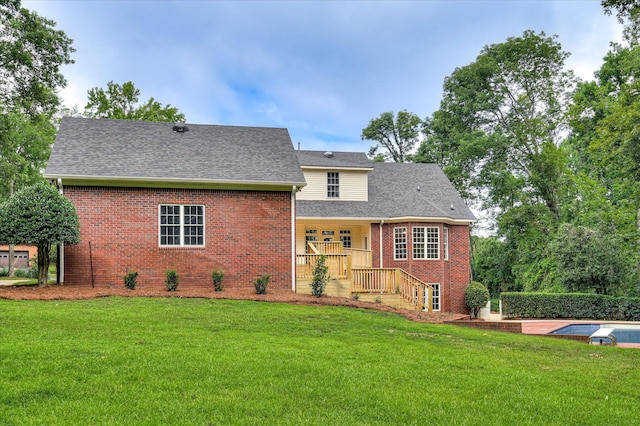1 Bohler Ave, Evans, GA 30809 - view of front of house with brick siding, a front yard, and roof with shingles