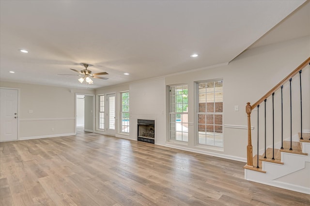 1 Bohler Ave, Evans, GA 30809 - unfurnished living room with light wood-style flooring, stairway, recessed lighting, ceiling fan, and crown molding