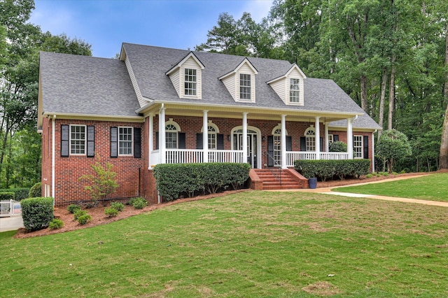 1 Bohler Ave, Evans, GA 30809 - cape cod-style house with brick siding, covered porch, a front lawn, and a shingled roof