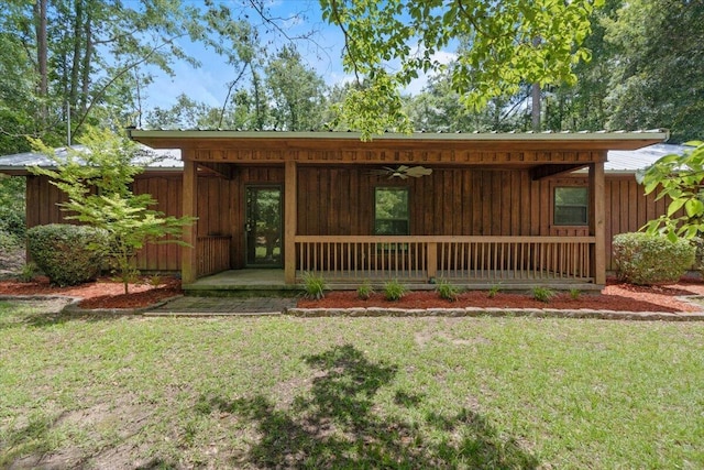 249 Usher Rd, Waynesboro, GA 30830 - view of grassy yard featuring ceiling fan and covered porch