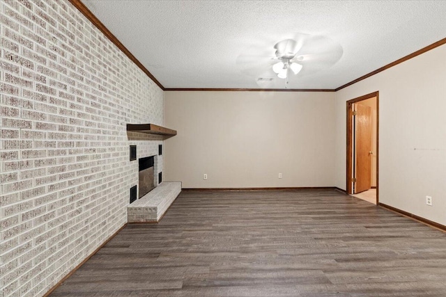 249 Usher Rd, Waynesboro, GA 30830 - unfurnished living room with crown molding, wood finished floors, brick wall, a textured ceiling, and ceiling fan