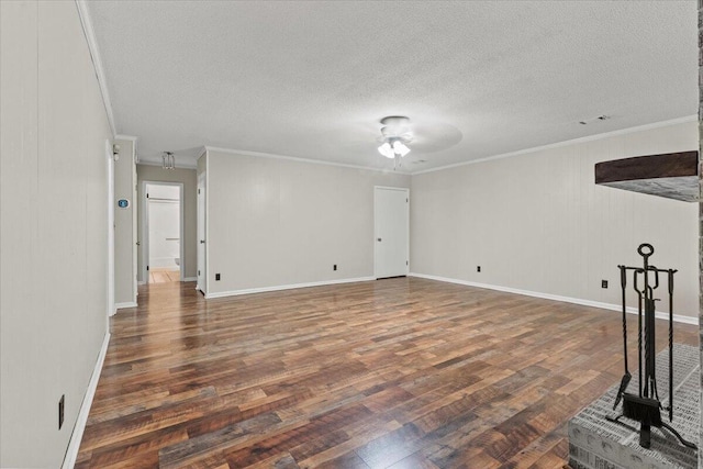 249 Usher Rd, Waynesboro, GA 30830 - unfurnished living room with wood finished floors, ornamental molding, ceiling fan, and a textured ceiling